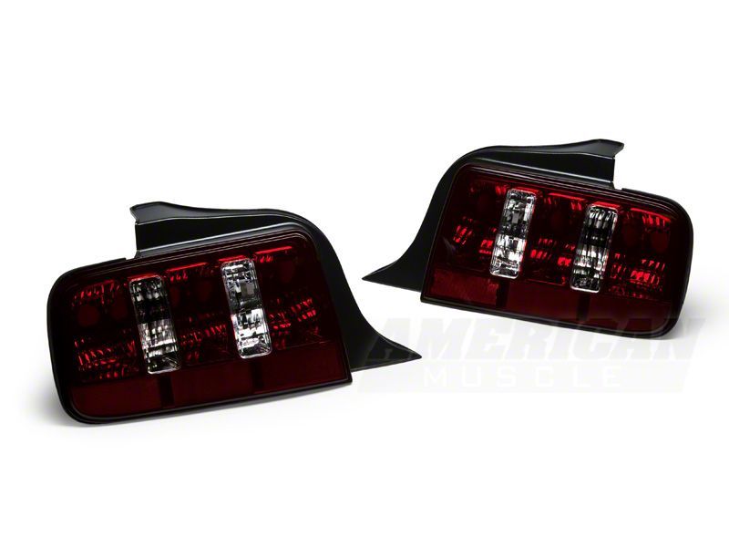 Raxiom 05-09 Ford Mustang Coyote Tail Lights- Blk Housing (Smoked Lens) Tail Lights Raxiom