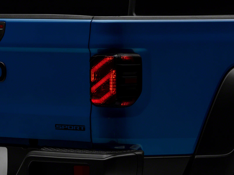 Raxiom 20-23 Jeep Gladiator JT Axial Series LED Tail Lights- Blk Housing (Smoked Lens) Tail Lights Raxiom
