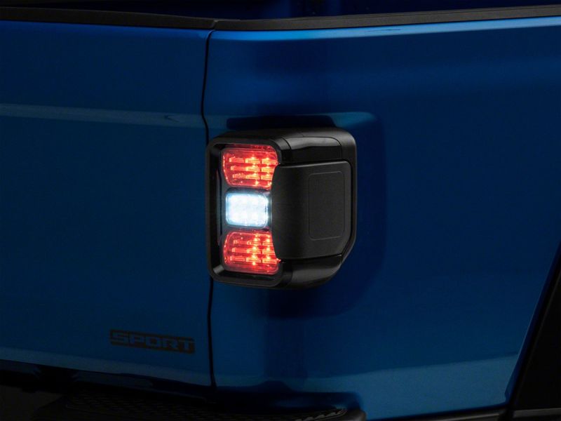 Raxiom 20-23 Jeep Gladiator JT Axial Series LED Tail Lights- Blk Housing (Smoked Lens) Tail Lights Raxiom