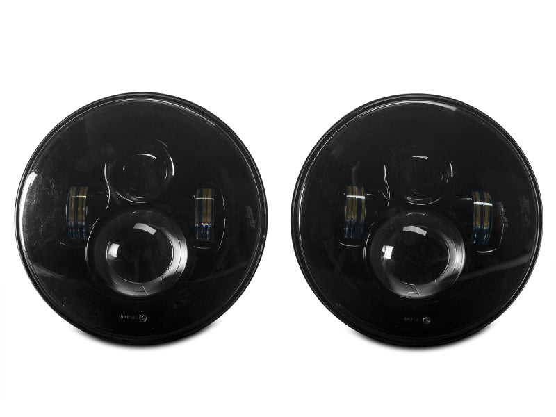 Raxiom 97-18 Jeep Wrangler TJ/JK Axial Series LED Daymaker Headlights- Black Housing (Clear Lens) Headlights Raxiom