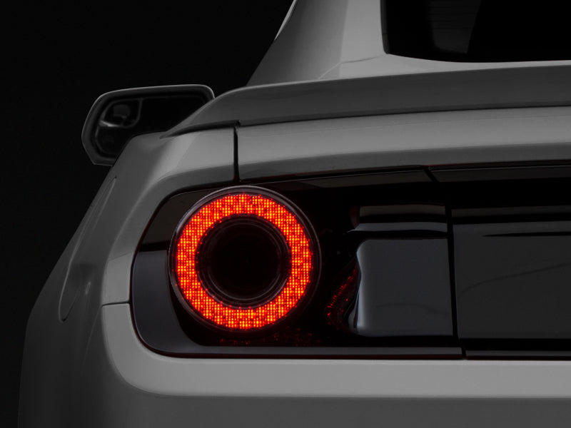 Raxiom 15-22 Ford Mustang Halo LED Tail Lights - Gloss Black Housing (Smoked Lens) Tail Lights Raxiom