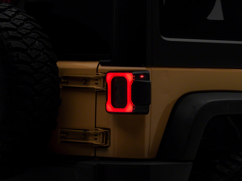 Raxiom 07-18 Jeep Wrangler JK Axial Series Carver LED Tail Lights- Blk Housing (Smoked Lens) Tail Lights Raxiom