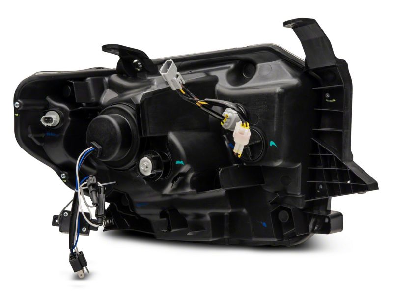 Raxiom 14-21 Toyota Tundra Axial Projector Headlights w/ SEQL LED Bar- Black Housing (Clear Lens) Headlights Raxiom