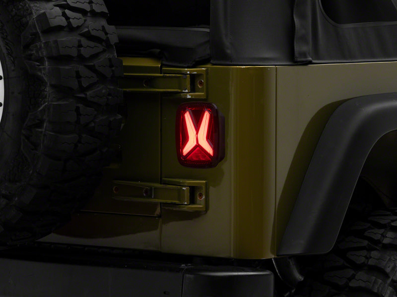 Raxiom 76-06 Jeep CJ7 Wrangler YJ & TJ Gladiator LED Tail Lights- Blk Housing (Smoked Lens) Tail Lights Raxiom