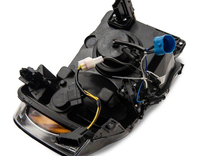 Raxiom 02-05 Dodge RAM 1500/2500/3500 Axial LED Projector Headlights- Blk Housing (Clear Lens) Headlights Raxiom