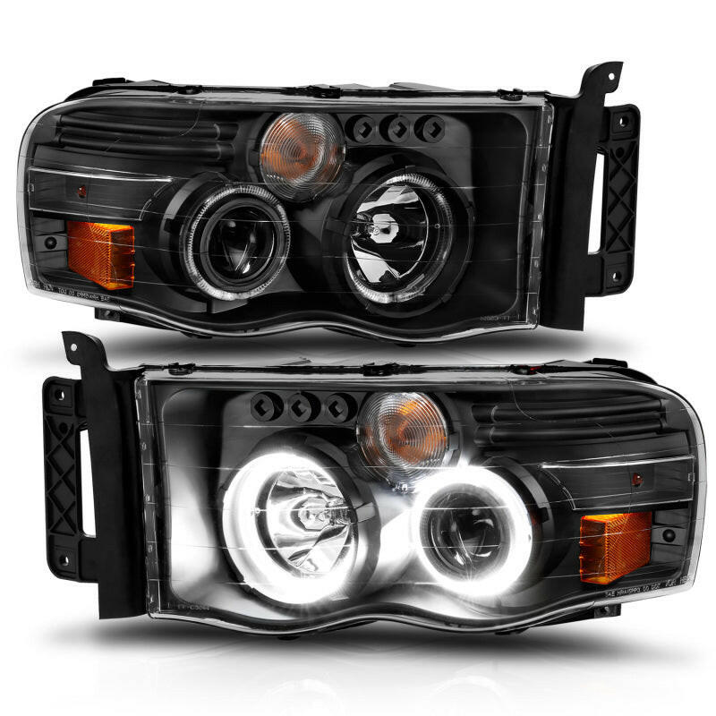 ANZO 2002-2005 Dodge Ram 1500 Projector Headlights w/ Halo Black Clear Amber Headlights ANZO