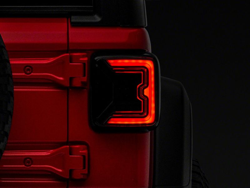 Raxiom 18-23 Jeep Wrangler JL Axial Series LED Tail Lights- Blk Housing (Smoked Lens) Tail Lights Raxiom