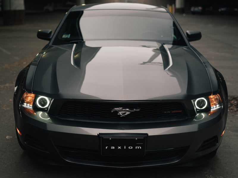 Raxiom 10-12 Ford Mustang w/ Headlights CCFL Halo Projector Headlights- Black Housing (Clear Lens) Headlights Raxiom
