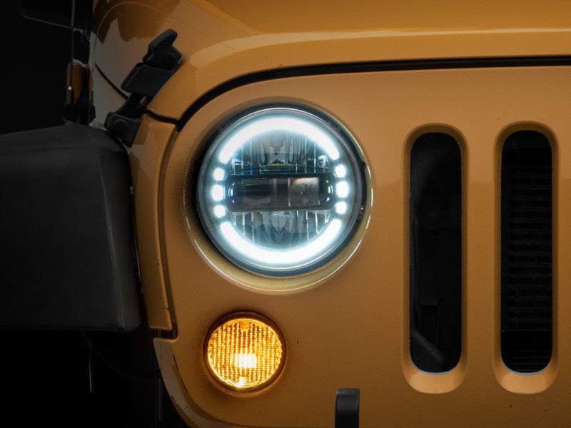Raxiom 97-18 Jeep Wrangler TJ/JK Axial 7-Inch LED Headlights w/ DRL- Black Housing (Clear Lens) Headlights Raxiom