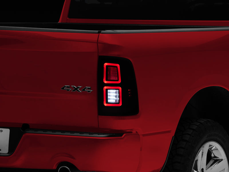 Raxiom 09-18 Dodge RAM 1500 LED Tail Lights- Black Housing (Smoked Lens) Tail Lights Raxiom