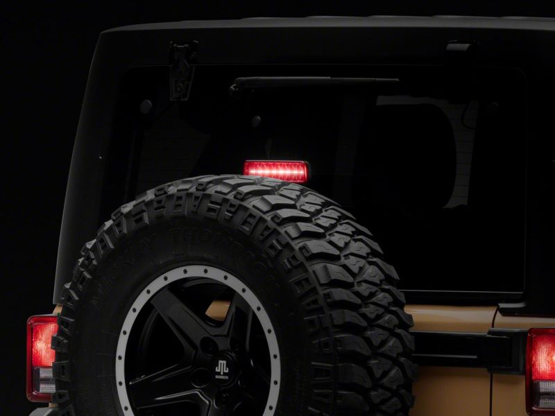 Raxiom 07-18 Jeep Wrangler JK Axial Series Hyper Flash LED Third Brake Light- Smoked Brake Lights Raxiom