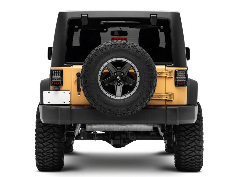 Raxiom 07-18 Jeep Wrangler JK Axial Series Lux LED Tail Lights- Blk Housing (Clear Lens) Tail Lights Raxiom
