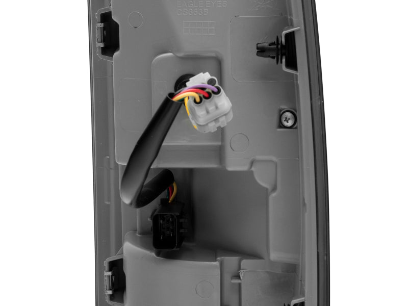 Raxiom 09-18 Dodge RAM 1500 LED Tail Lights- Black Housing (Smoked Lens) Tail Lights Raxiom