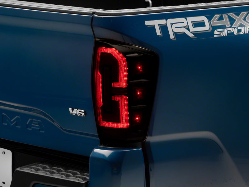 Raxiom 16-23 Toyota Tacoma LED Tail Lights- Blk Housing (Smoked Lens) Tail Lights Raxiom