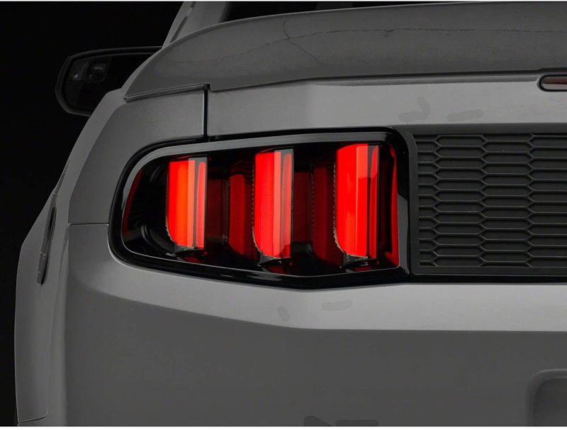 Raxiom 10-12 Ford Mustang Vector V2 LED Tail Lights - Gloss Black Housing (Clear Lens) Tail Lights Raxiom