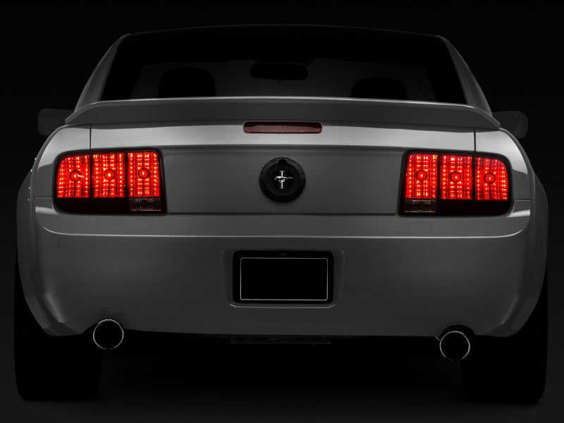 Raxiom 05-09 Ford Mustang Tail Lights- Black Housing (Smoked Lens) Tail Lights Raxiom
