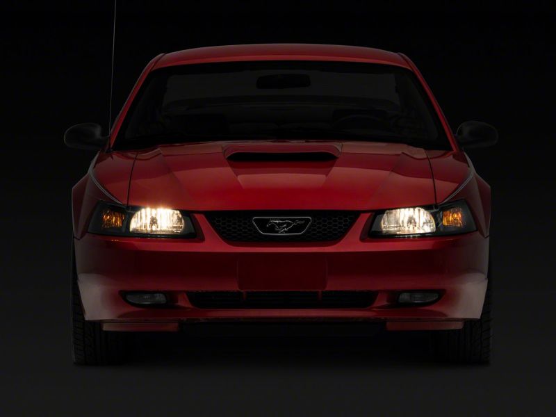 Raxiom 99-04 Ford Mustang Axial Series OEM Style Replacement Headlights- Black Housing (Smoked Lens) Headlights Raxiom