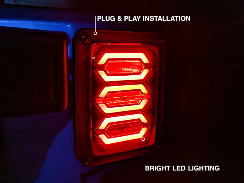 Raxiom 07-18 Jeep Wrangler JK LED Tail Lights- Black Housing (Smoked Lens) Tail Lights Raxiom