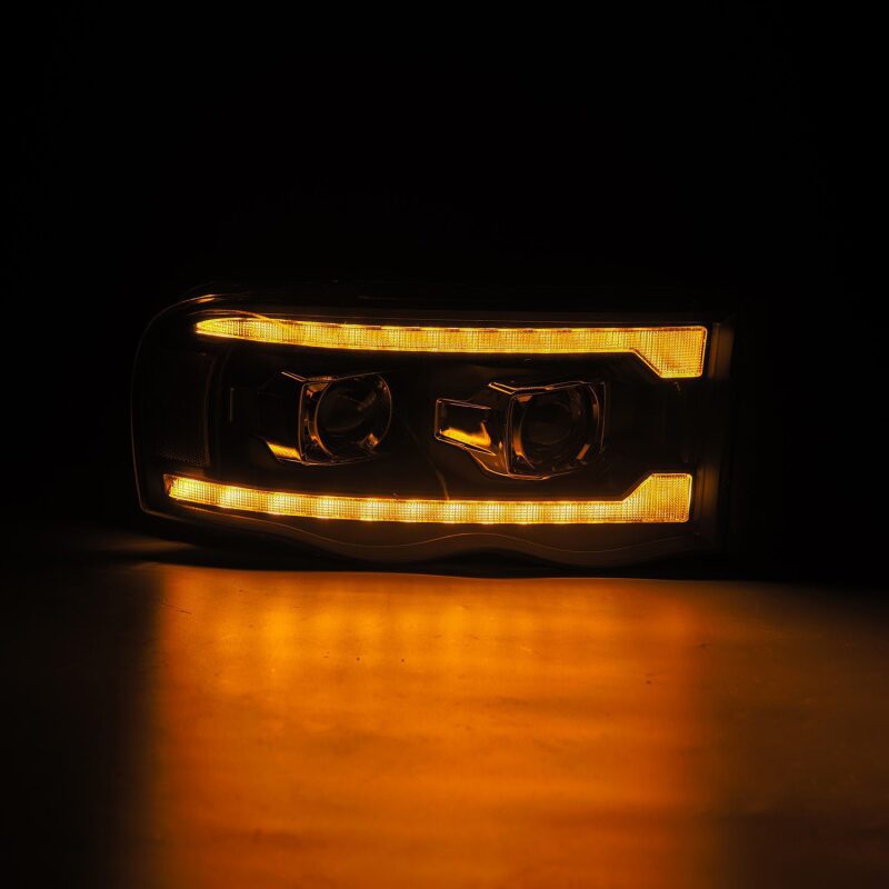 AlphaRex 02-05 Dodge Ram 1500 PRO-Series Projector Headlights Plank Style Black w/Seq Signal Headlights AlphaRex