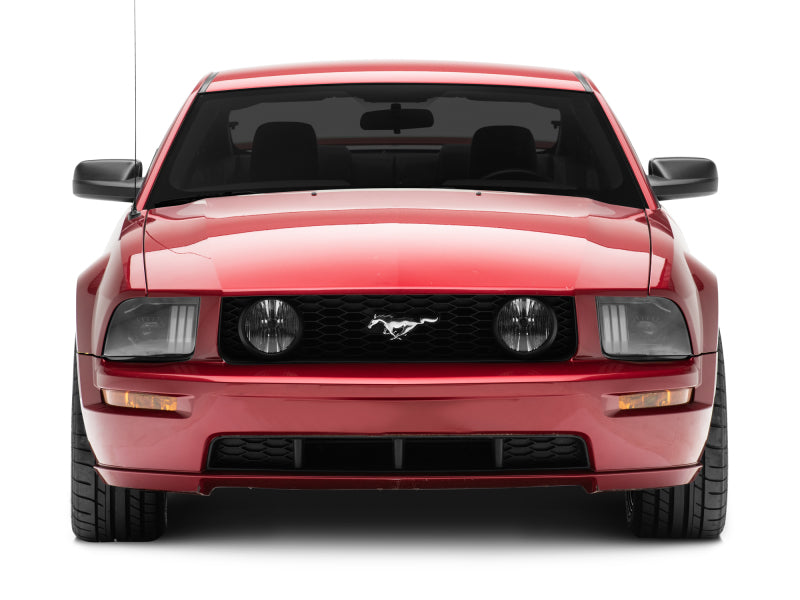 Raxiom 05-09 Ford Mustang w/ Halogen Prjctor Headlights- Black Housing (Clear Lens) (No GT500 ) Headlights Raxiom