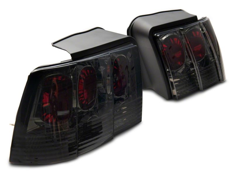 Raxiom 99-04 Ford Mustang Axial Series Altezza Style Tail Lights- Blk Housing (Smoked Lens) Tail Lights Raxiom