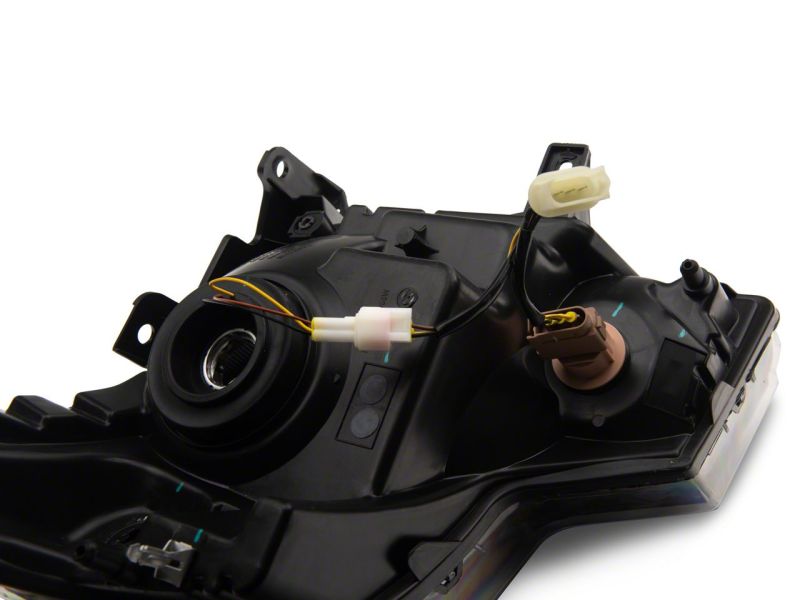 Raxiom 09-14 Ford F-150 Axial Series Headlight w/ SEQL LED Bar- Blk Housing (Clear Lens) Light Bars & Cubes Raxiom