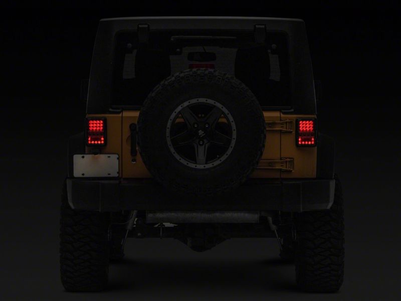 Raxiom 07-18 Jeep Wrangler JK Axial Series Lux LED Tail Lights- Blk Housing (Clear Lens) Tail Lights Raxiom