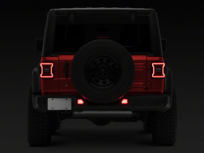 Raxiom 18-23 Jeep Wrangler JL Moab Rubicon Sahara Axial LED Rear Bumper Reflector Lights- Clear Light Bars & Cubes Raxiom