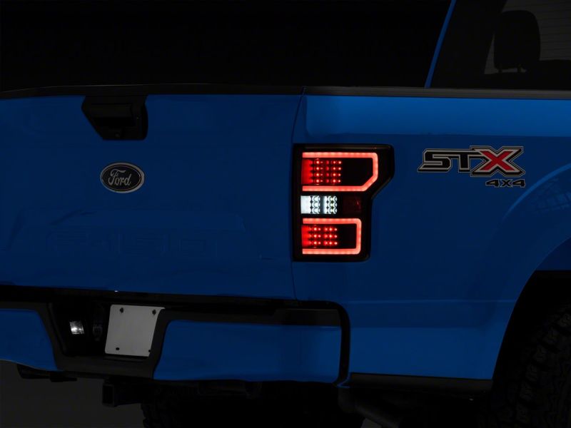 Raxiom 18-20 Ford F-150 Axial Series LED Tail Lights w/ SEQL Turn Signals- Blk Housing (Clear Lens) Tail Lights Raxiom