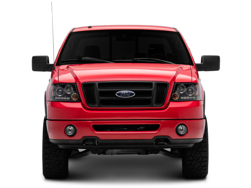 Raxiom 04-08 Ford F-150 Dual LED Halo Projector Headlights- Black Housing (Clear Lens) Headlights Raxiom