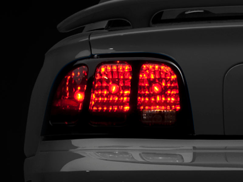 Raxiom 96-98 Ford Mustang Tail Lights- Black Housing (Smoked Lens) Tail Lights Raxiom