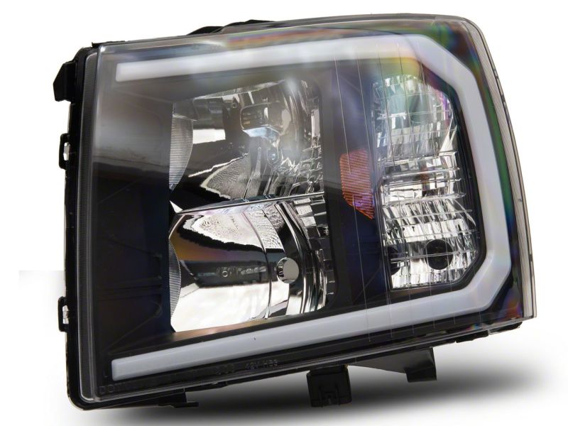 Raxiom 07-13 Chevrolet Silverado 1500 Axial Series Headlights w/ LED Bar- Black Housing (Clear Lens) Headlights Raxiom