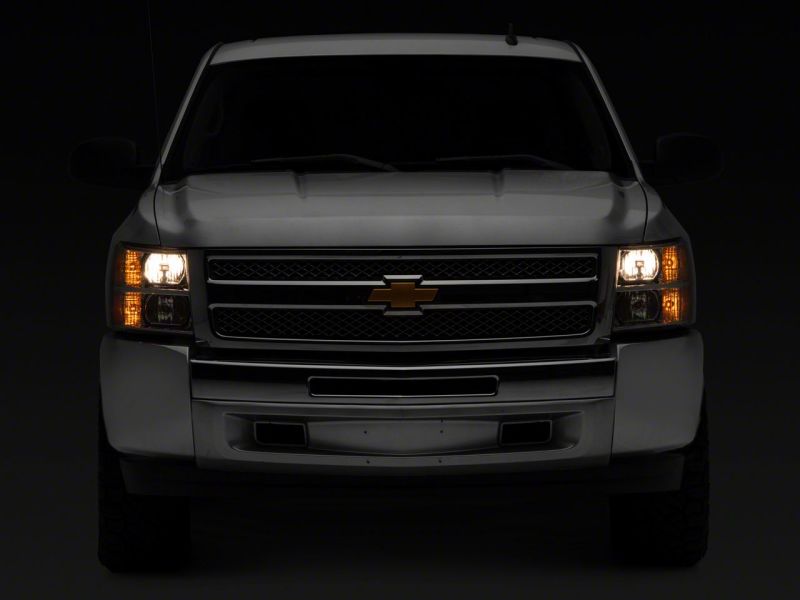 Raxiom 07-14 Chevrolet Silverado 1500 Axial OEM Rep Headlights- Chrome Housing (Clear Lens) Headlights Raxiom