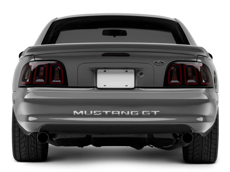 Raxiom 96-98 Ford Mustang Icon LED Tail Lights- Black Housing (Smoked Lens) Tail Lights Raxiom