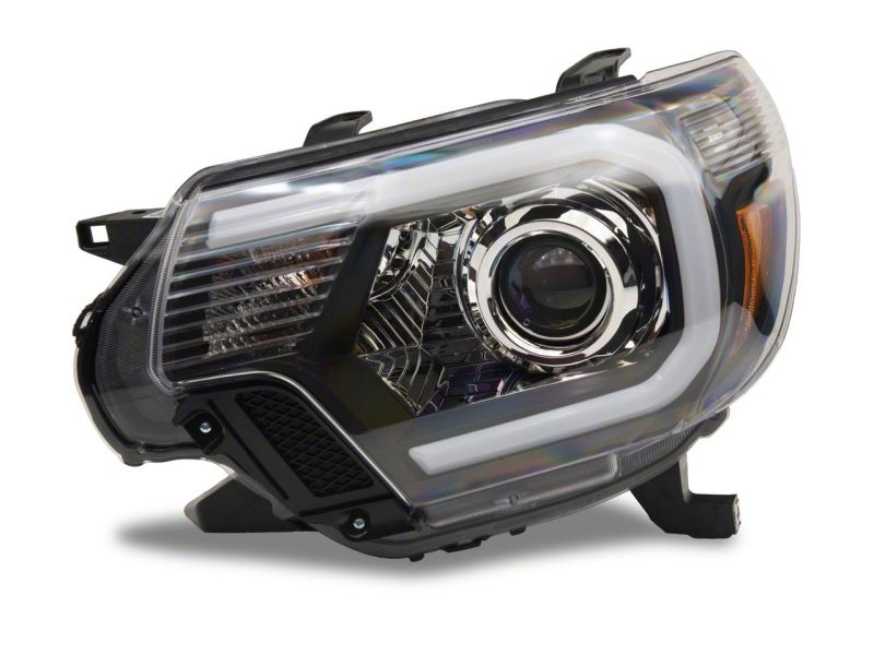 Raxiom 12-15 Toyota Tacoma Axial Projector Headlights w/ SEQL LED Bar- Black Housing (Clear Lens) Headlights Raxiom