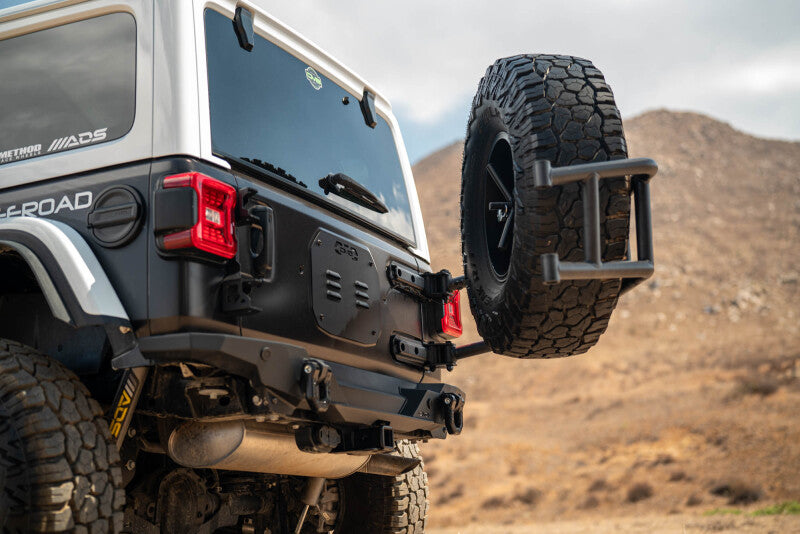DV8 18-25 Jeep Wrangler JL Body Mounted Tire Carrier Chase Racks DV8 Offroad