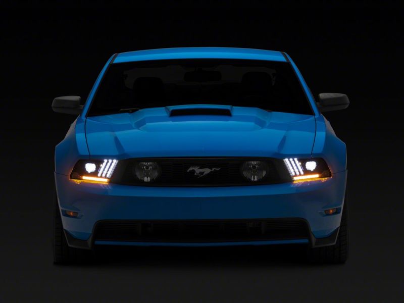 Raxiom 10-12 Ford Mustang LED Projector Headlights SEQL Turn Signals- Blk Housing (Clear Lens) Headlights Raxiom