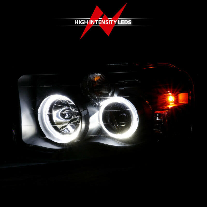 ANZO 2002-2005 Dodge Ram 1500 Projector Headlights w/ Halo Black Clear Amber Headlights ANZO