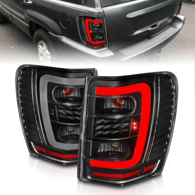ANZO 1999-2004 Jeep Grand Cherokee LED Tail Lights w/ Light Bar Black Housing Clear Lens Tail Lights ANZO
