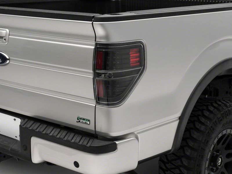 Raxiom 09-14 Ford F-150 Styleside LED Tail Lights- Blk Housing (Clear Lens) Tail Lights Raxiom
