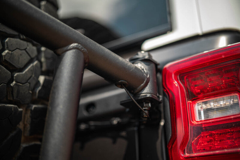 DV8 18-25 Jeep Wrangler JL Body Mounted Tire Carrier Chase Racks DV8 Offroad