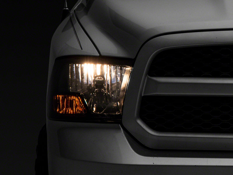 Raxiom 09-18 Dodge RAM 1500 Axial OEM Rep Headlights w/ Single Bulb- Chrome Housing (Smoked Lens) Headlights Raxiom