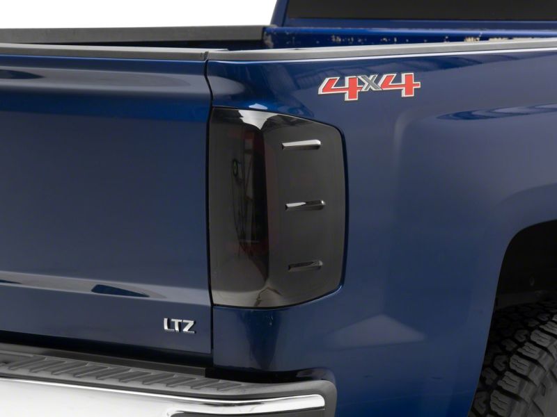 Raxiom 14-18 Chevrolet Silverado 1500 Axial Series LED Tail Lights- Blk Housing (Smoked Lens) Tail Lights Raxiom