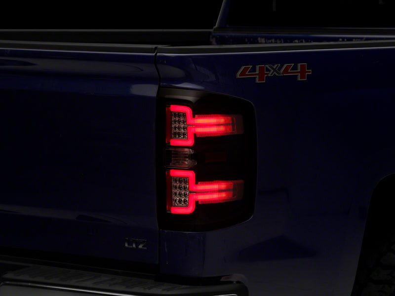 Raxiom 14-18 Chevrolet Silverado 1500 LED Taillights w/ SEQL Turn Signals- Blk Housing (Clear Lens) Lights Corner Raxiom