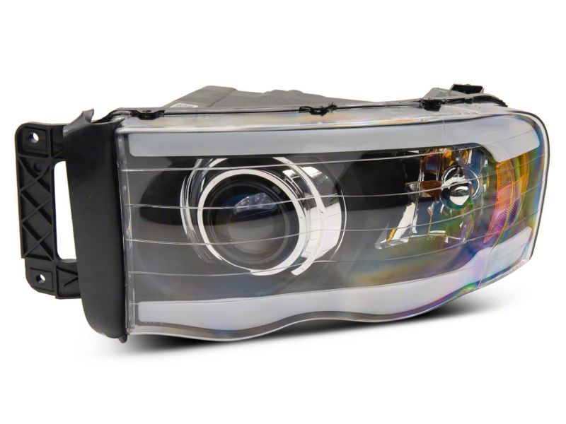 Raxiom 02-05 Dodge RAM 1500 LED Projector Headlights w/ SEQL LED Bar- Blk Housing (Clear Lens) Headlights Raxiom