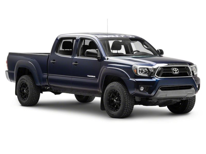 Raxiom 12-15 Toyota Tacoma Axial Projector Headlights w/ SEQL LED Bar- Black Housing (Clear Lens) Headlights Raxiom