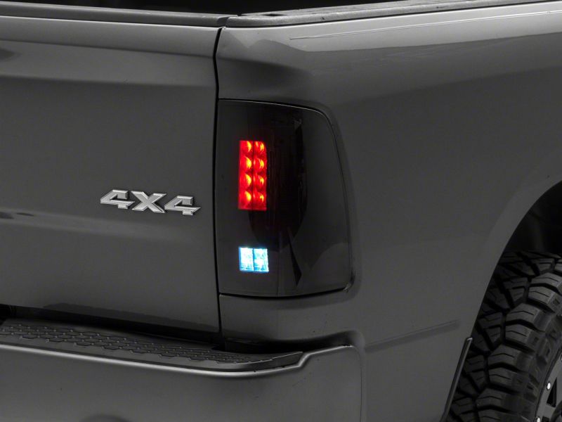 Raxiom 09-18 Dodge RAM 1500/2500/3500 Axial Series LED Tail Lights- Blk Housing (Smoked Lens) Tail Lights Raxiom