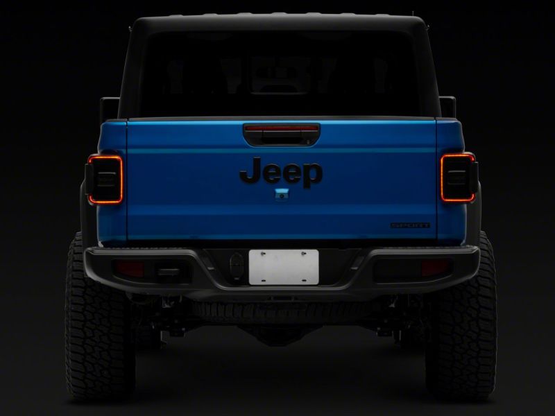 Raxiom 20-23 Jeep Gladiator JT w/ Factory Halogen LED Tail Lights- Blk Housing (Smoked Lens) Tail Lights Raxiom