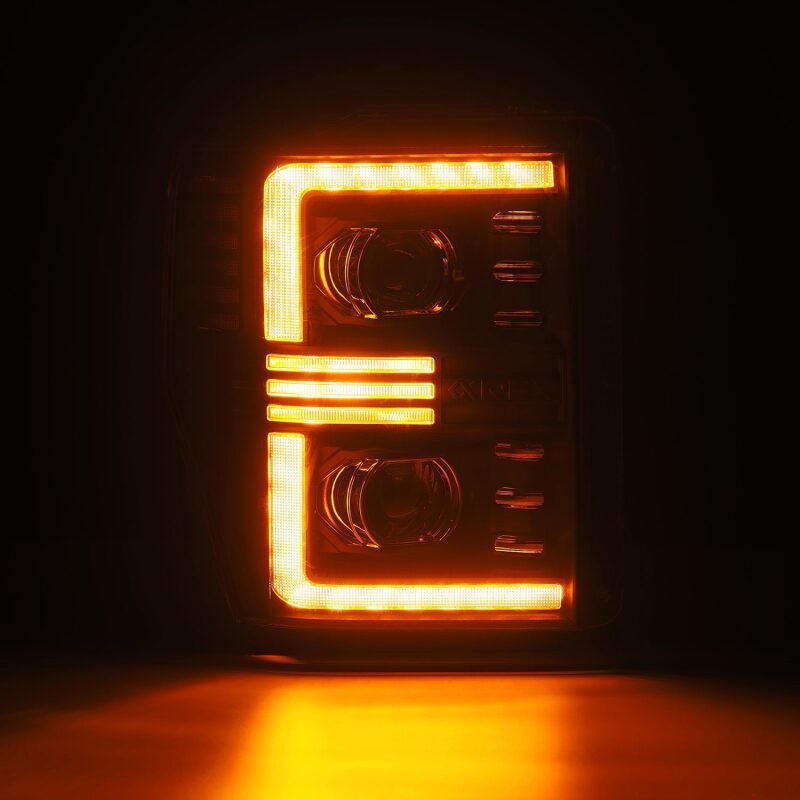 AlphaRex 08-10 Ford F250-550 PRO-Series Projector headlights Black w/Activ Light/Seq Signal Headlights AlphaRex