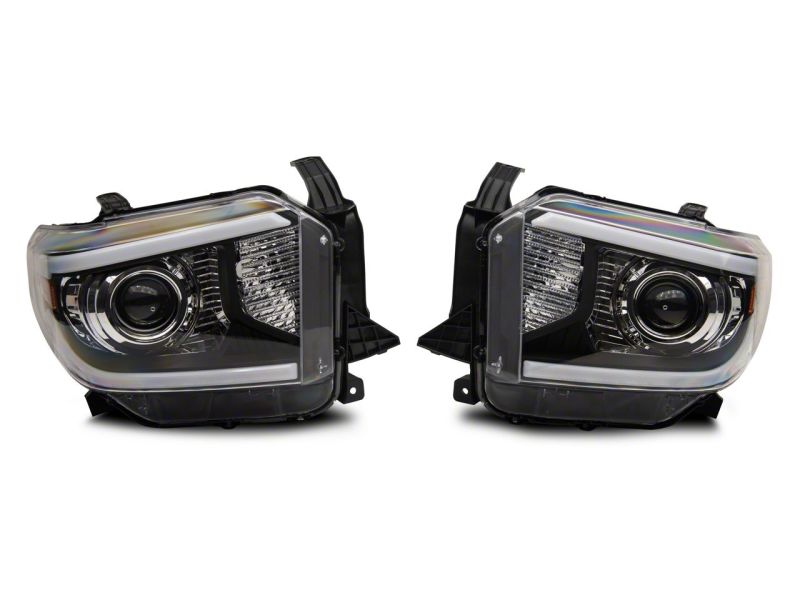 Raxiom 14-21 Toyota Tundra Axial Series Projector Headlights w/ LED Bar- Blk Housing (Clear Lens) Headlights Raxiom